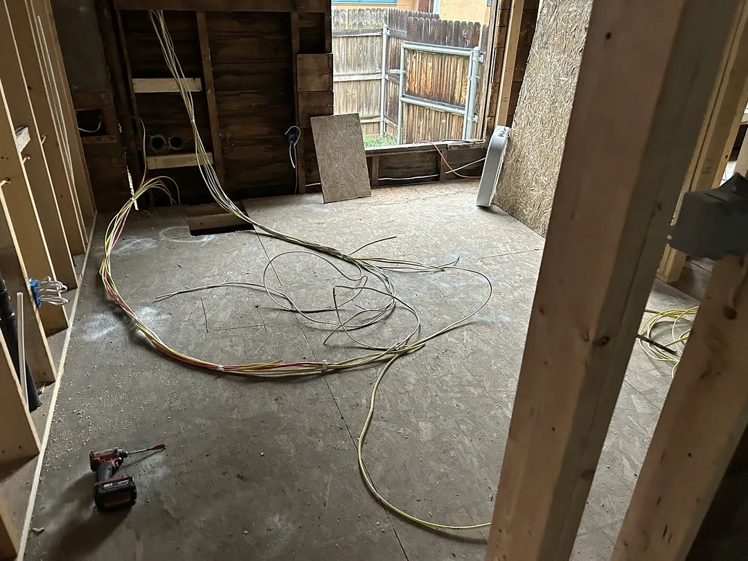 New wiring runs laid out during an older-home rewiring project in the Flagstaff area.